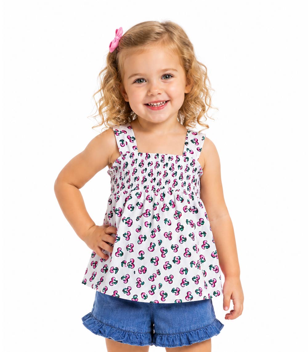 Top con canesú ahumado y short vaquero con volante para niña en color rosa - 2176502